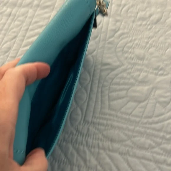 NWOT Coach large flap wristlet. - Picture 7 of 10